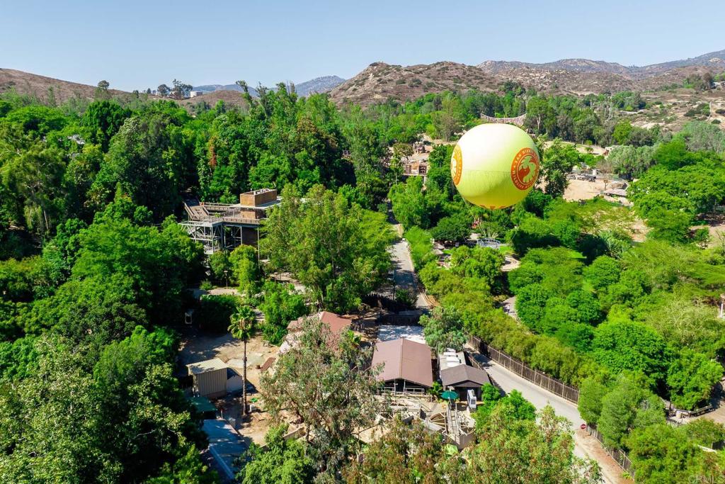 3913 Summer Way Escondido, CA 92025 - Photo 40 of 40 a view of a house with a swimming pool and a trees