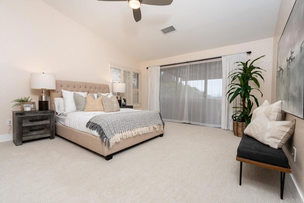 3913 Summer Way Escondido, CA 92025 - Photo 5 of 40 a bedroom with a bed and a couch