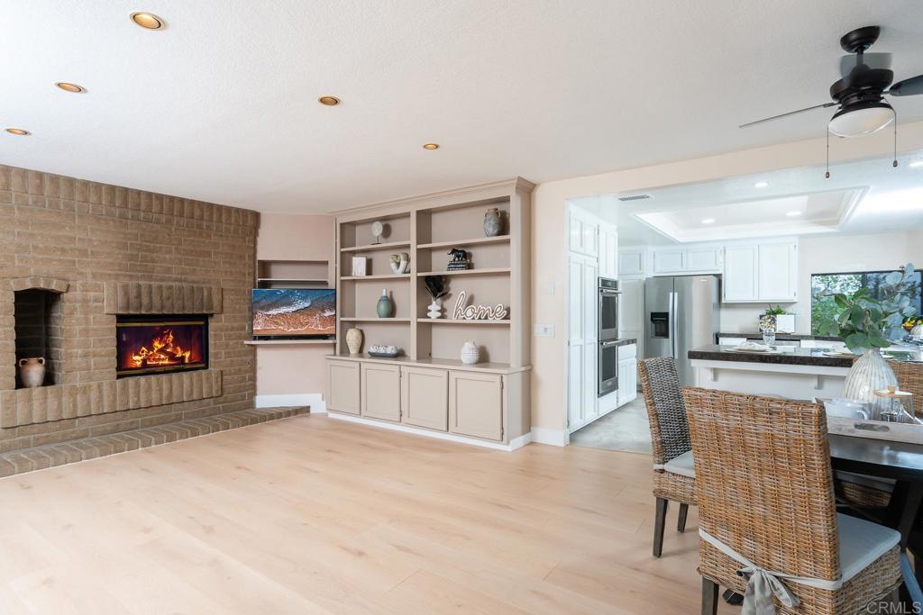 3913 Summer Way Escondido, CA 92025 - Photo 10 of 40 a living room with furniture and a fireplace