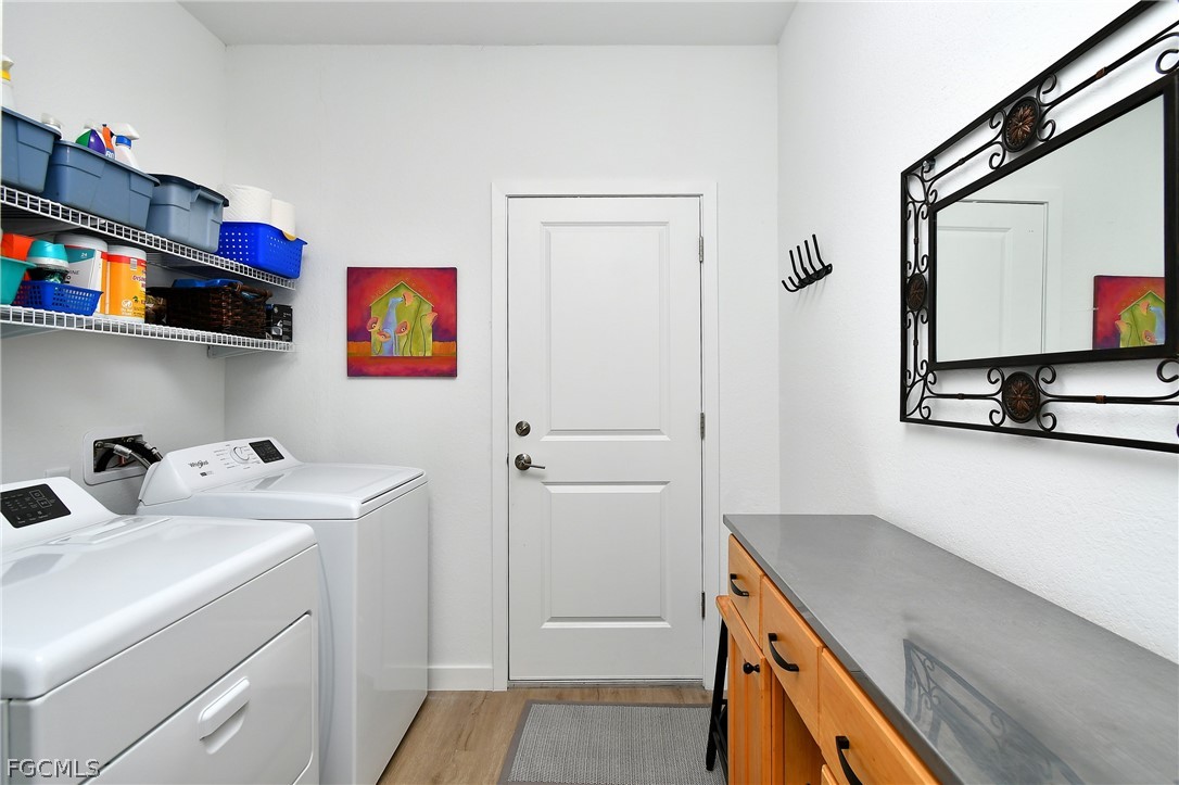 809 Bell Boulevard Lehigh Acres, FL 33974 - Photo 30 of 37 a room with storage and utility