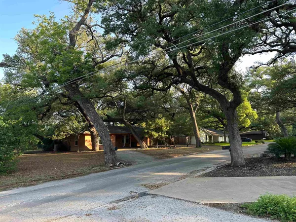 a view of road with a tree