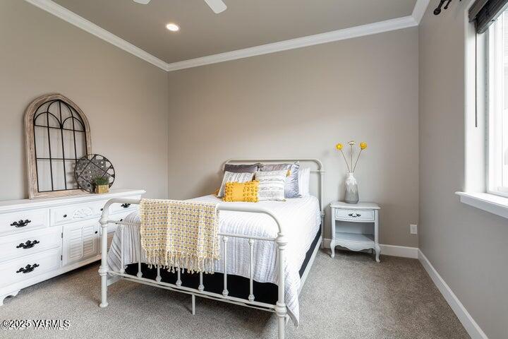 7310 Whitman Avenue Yakima, WA 98903 - Photo 19 of 31 a bedroom with a bed and a window