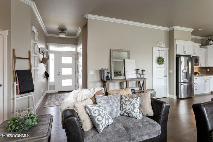 7310 Whitman Avenue Yakima, WA 98903 - Photo 7 of 31 a living room with furniture fireplace and a flat screen tv