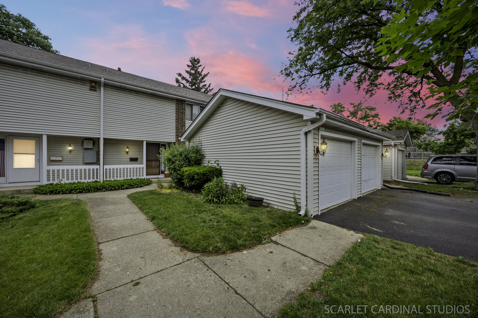 4S768 Pinehurst Drive Naperville, IL 60563 - Photo 1 of 15 a front view of a house with a garden