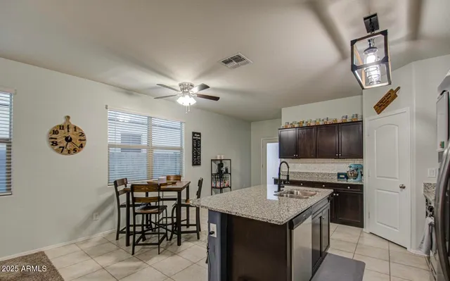 a view of a livingroom with furniture and window