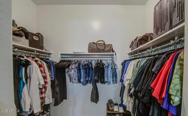 a bathroom with a sink a toilet and shower curtain