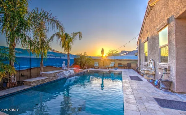 a backyard of a house with seating space