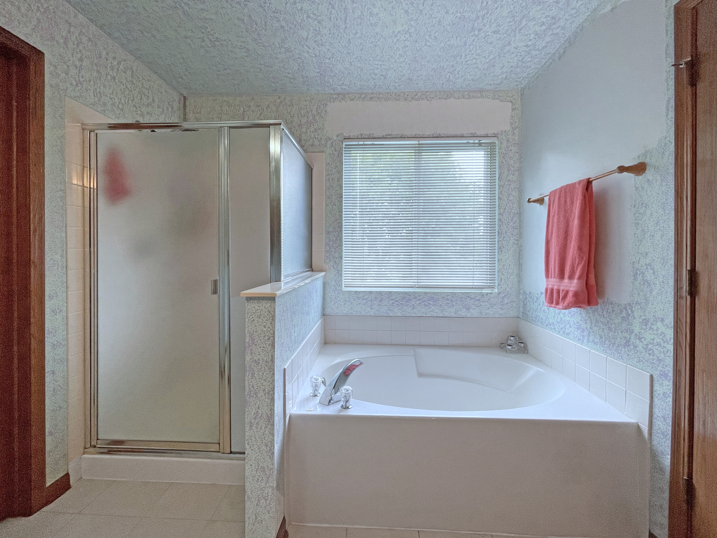 2048 Norwich Drive Bartlett, IL 60103 - Photo 14 of 25 a bathroom with a tub shower vanity and a sink