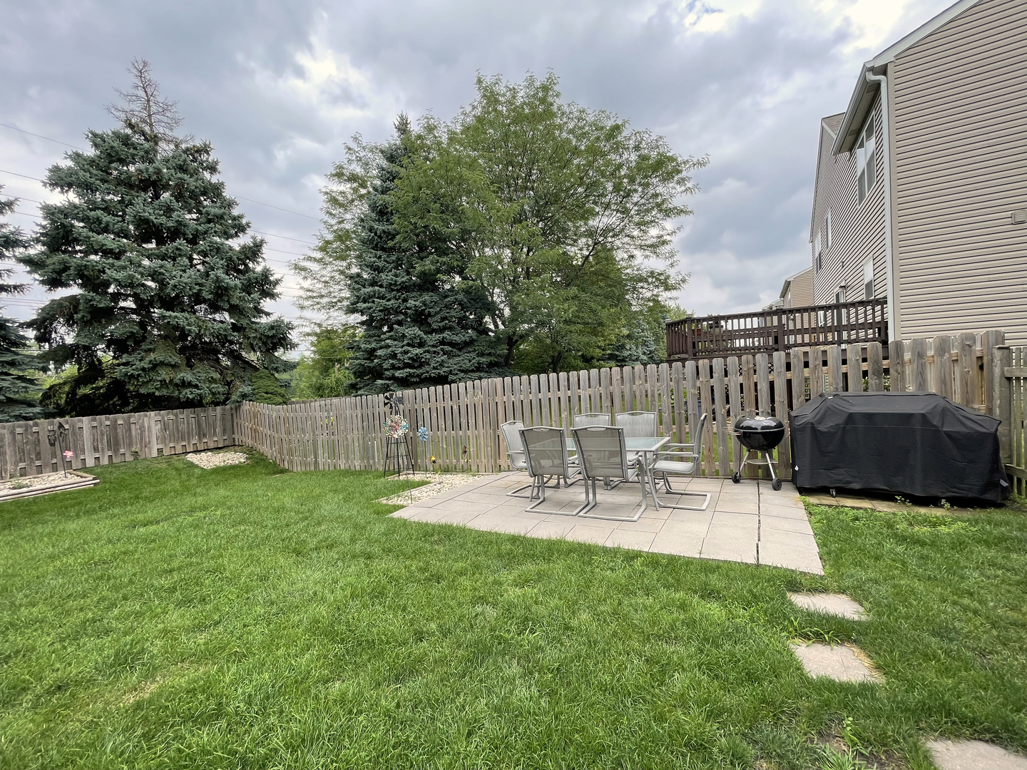 2048 Norwich Drive Bartlett, IL 60103 - Photo 21 of 25 a view of backyard with a patio and a garden