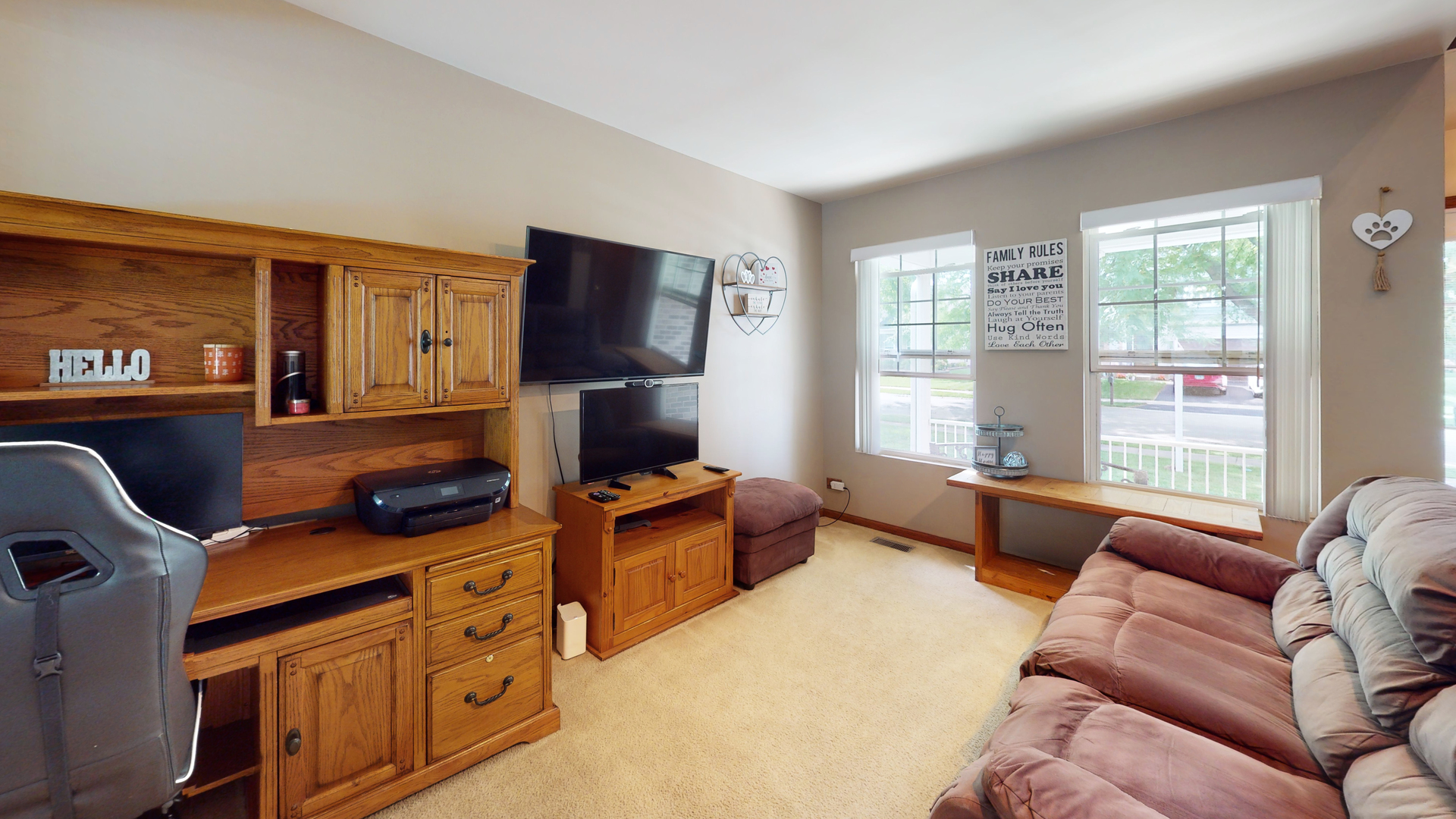 2048 Norwich Drive Bartlett, IL 60103 - Photo 8 of 25 a bedroom with furniture and a flat screen tv