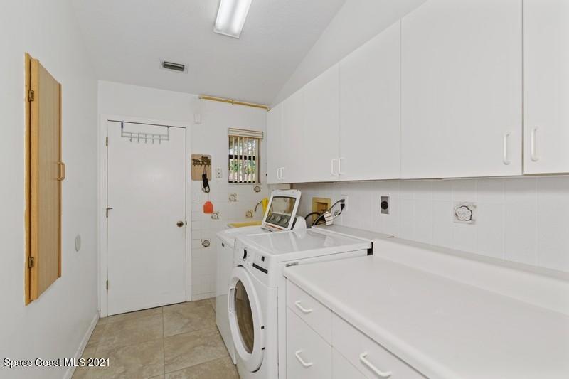 3365 Holly Springs Road Melbourne, FL 32934 - Photo 13 of 16 Inside Laundry Room