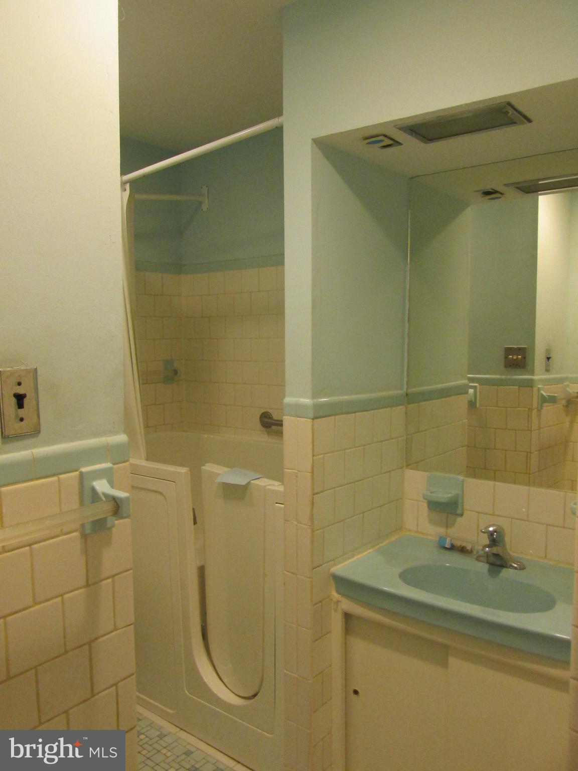 3006 Dunmore Road Baltimore, MD 21222 - Photo 21 of 42 Handicap bathroom with walk in tub