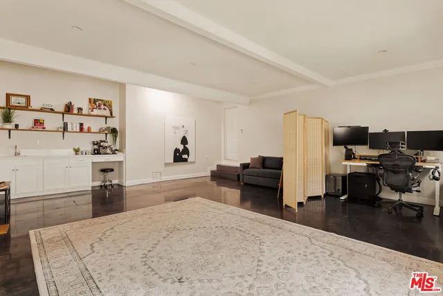 a bedroom with a bed and furniture