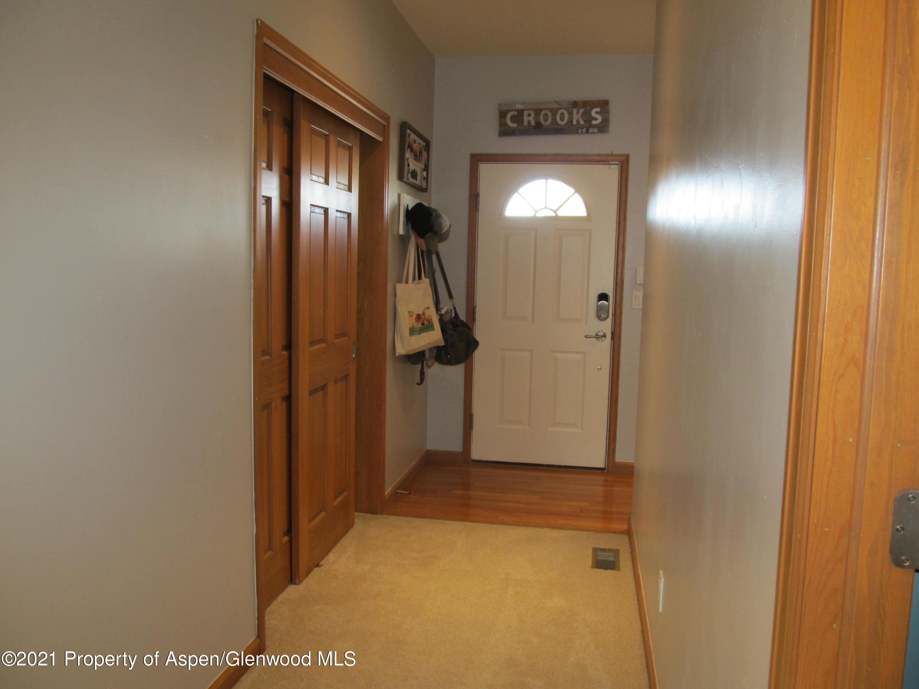 1123 East 19th Street Rifle, CO 81650 - Photo 14 of 37 a view of a livingroom from a hallway