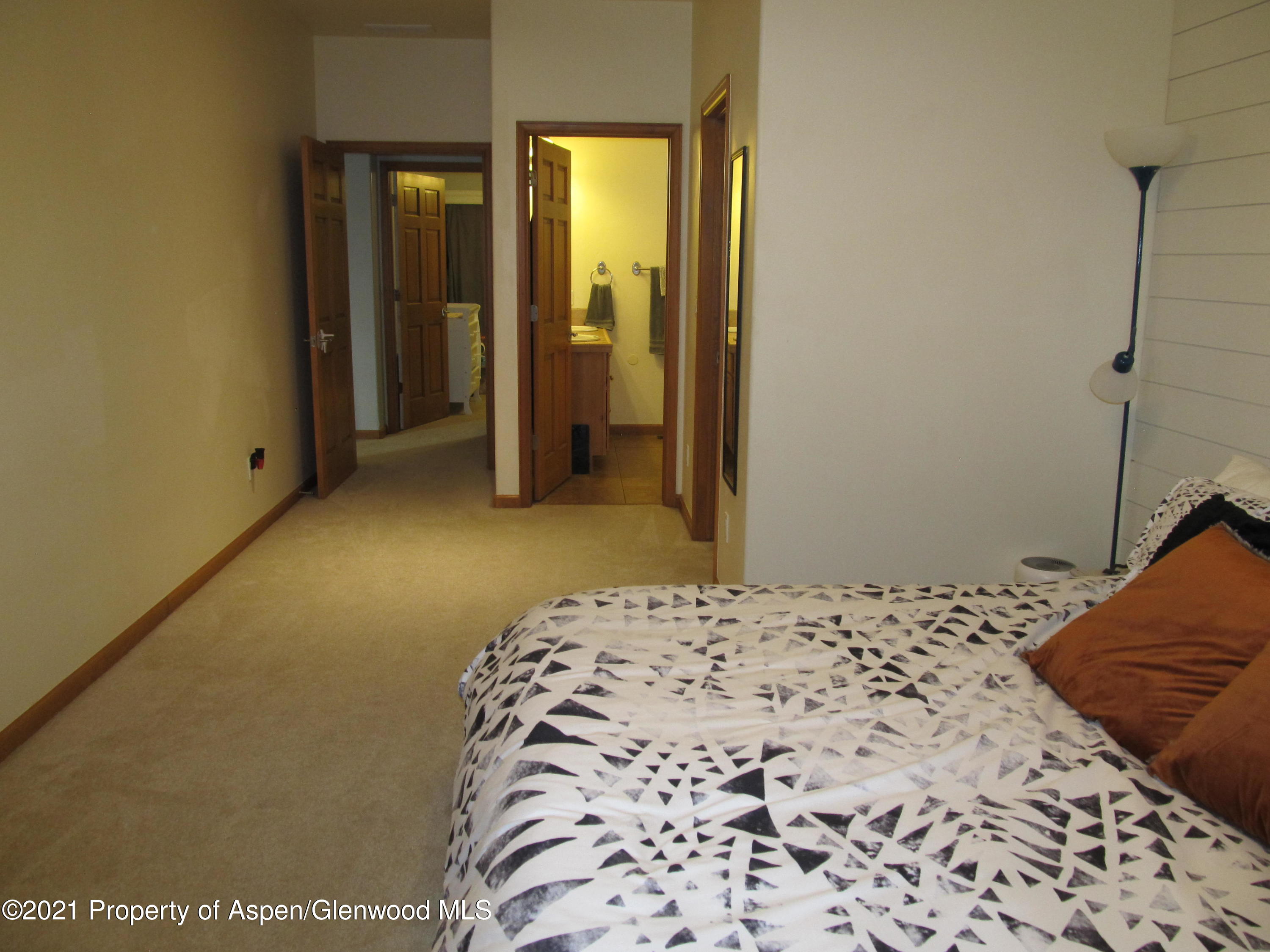 1123 East 19th Street Rifle, CO 81650 - Photo 21 of 37 a bedroom with a bed and a window