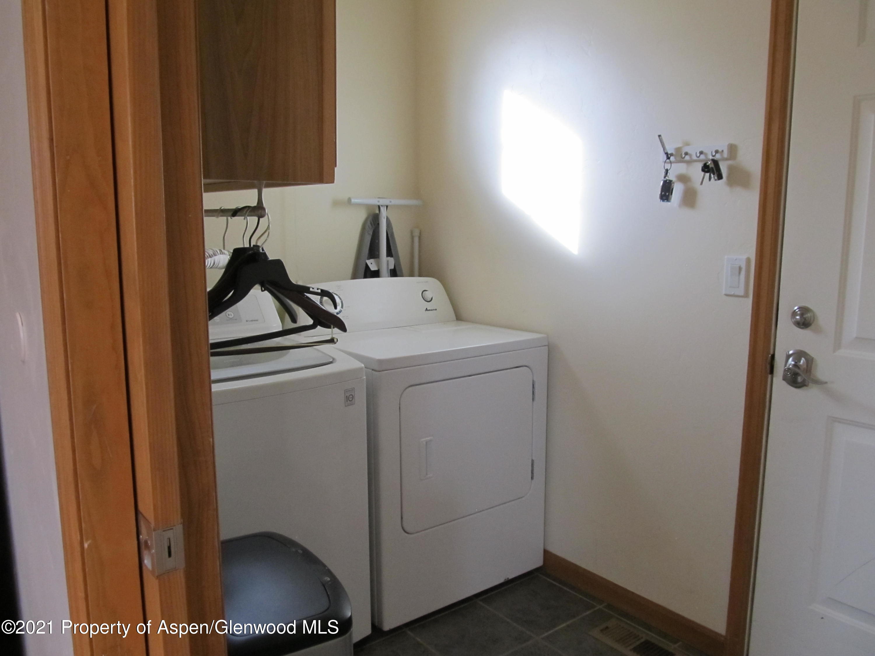 1123 East 19th Street Rifle, CO 81650 - Photo 31 of 37 a utility room with dryer and washer