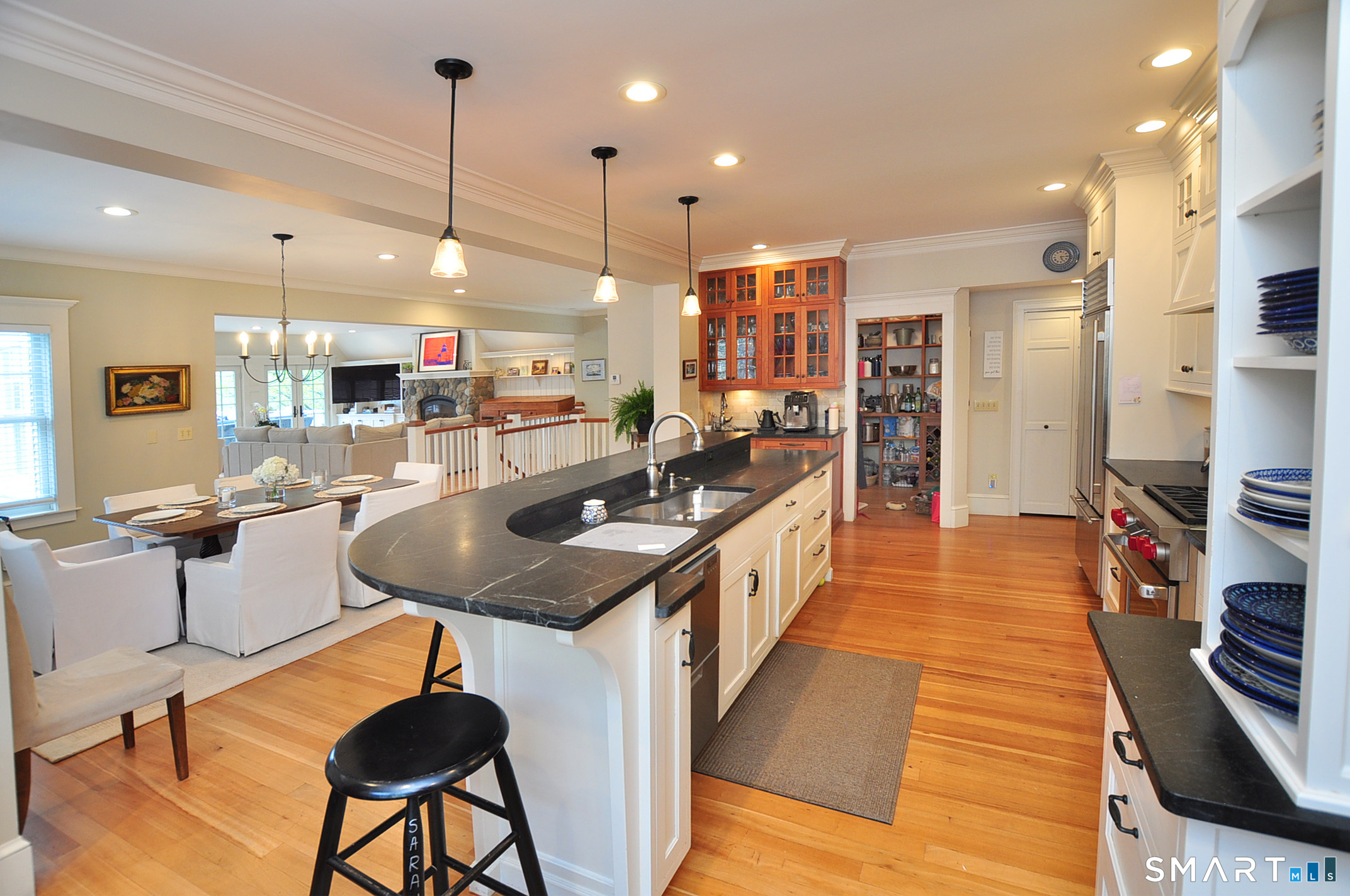 371 North Main Street Suffield, CT 06078 - Photo 14 of 39 a kitchen with stainless steel appliances kitchen island granite countertop a sink and a refrigerator