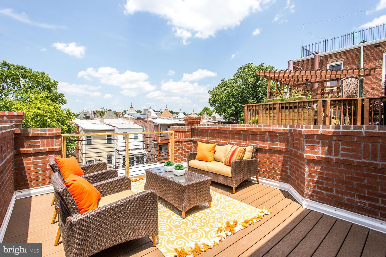 59 Randolph Place Northwest, Unit PH Washington, DC 20001 - Photo 23 of 27 a view of a terrace with seating area