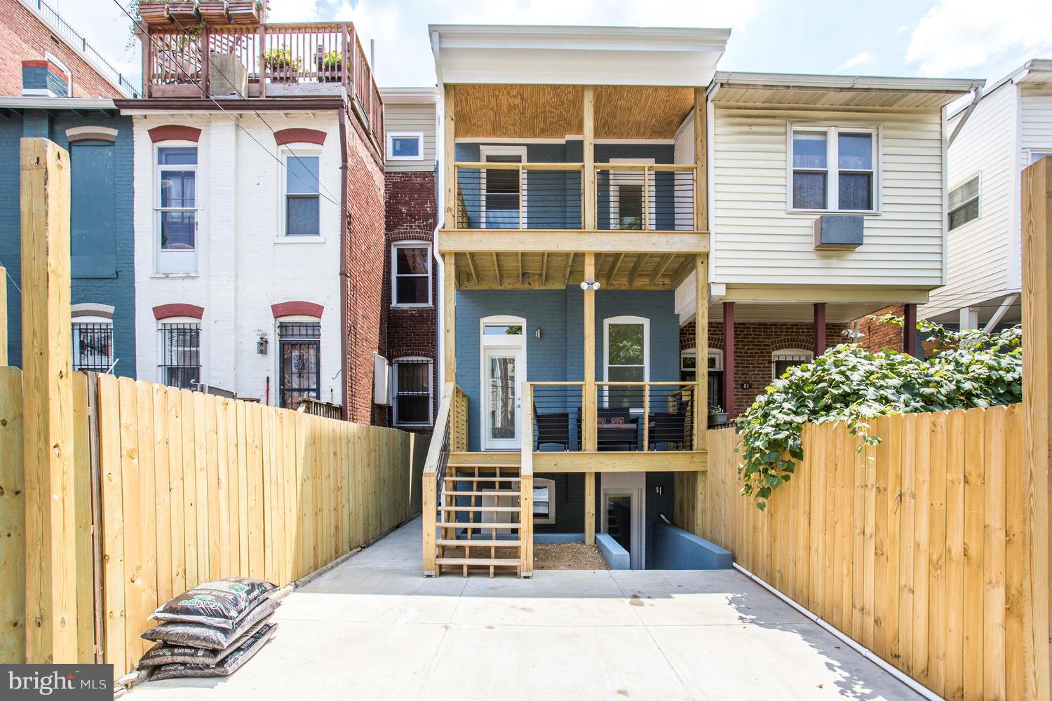 59 Randolph Place Northwest, Unit PH Washington, DC 20001 - Photo 26 of 27 a front view of a house with a porch