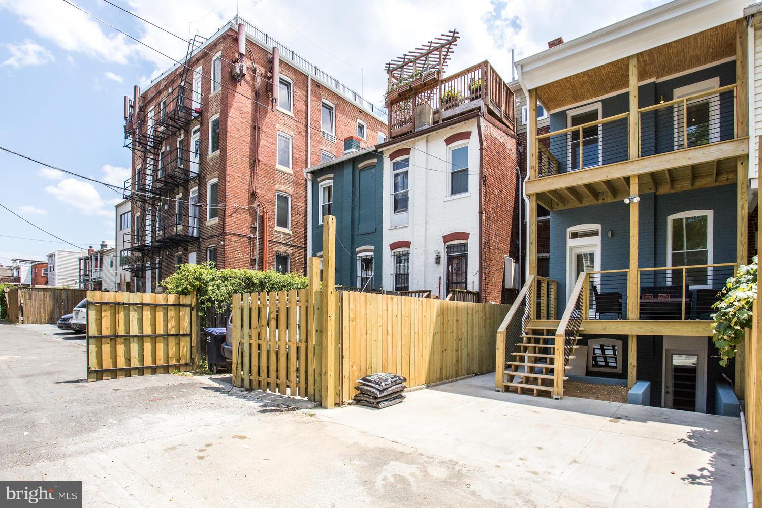 59 Randolph Place Northwest, Unit PH Washington, DC 20001 - Photo 27 of 27 a view of a building with a snow in front of it