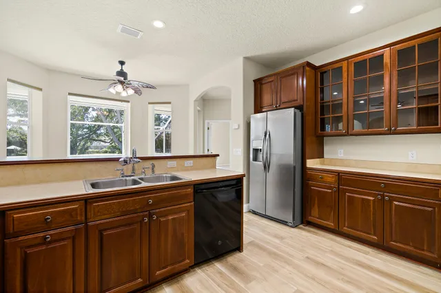 a bathroom with a sink and a window