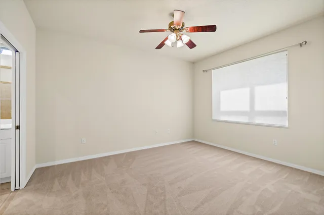 a bathroom with a sink vanity and a mirror