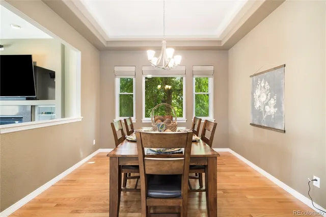 a dining room with furniture window wooden floor
