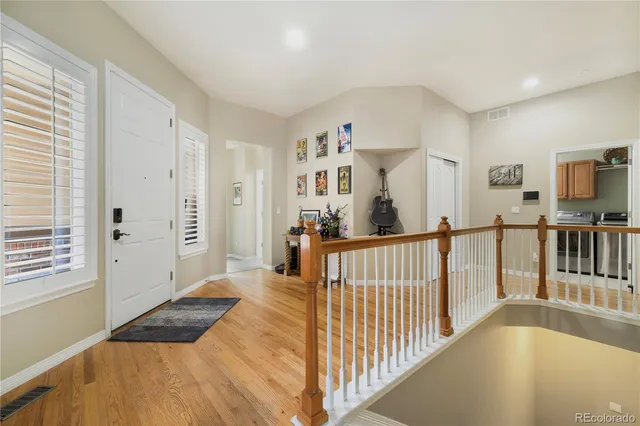 a view of a bedroom with furniture and staircase