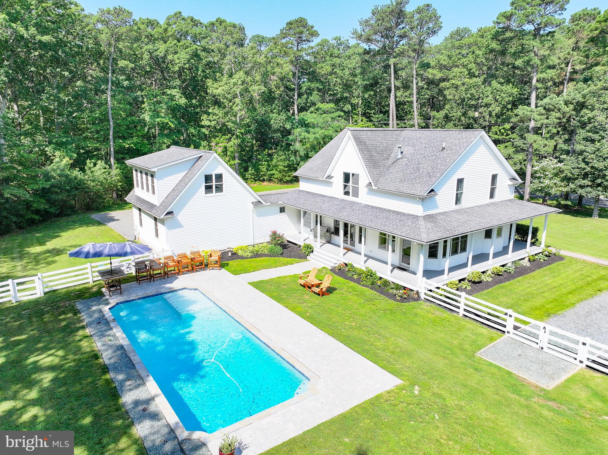 7841 Pea Neck Road St. Michaels, MD 21663 - Photo 1 of 41 an aerial view of a house with a big yard