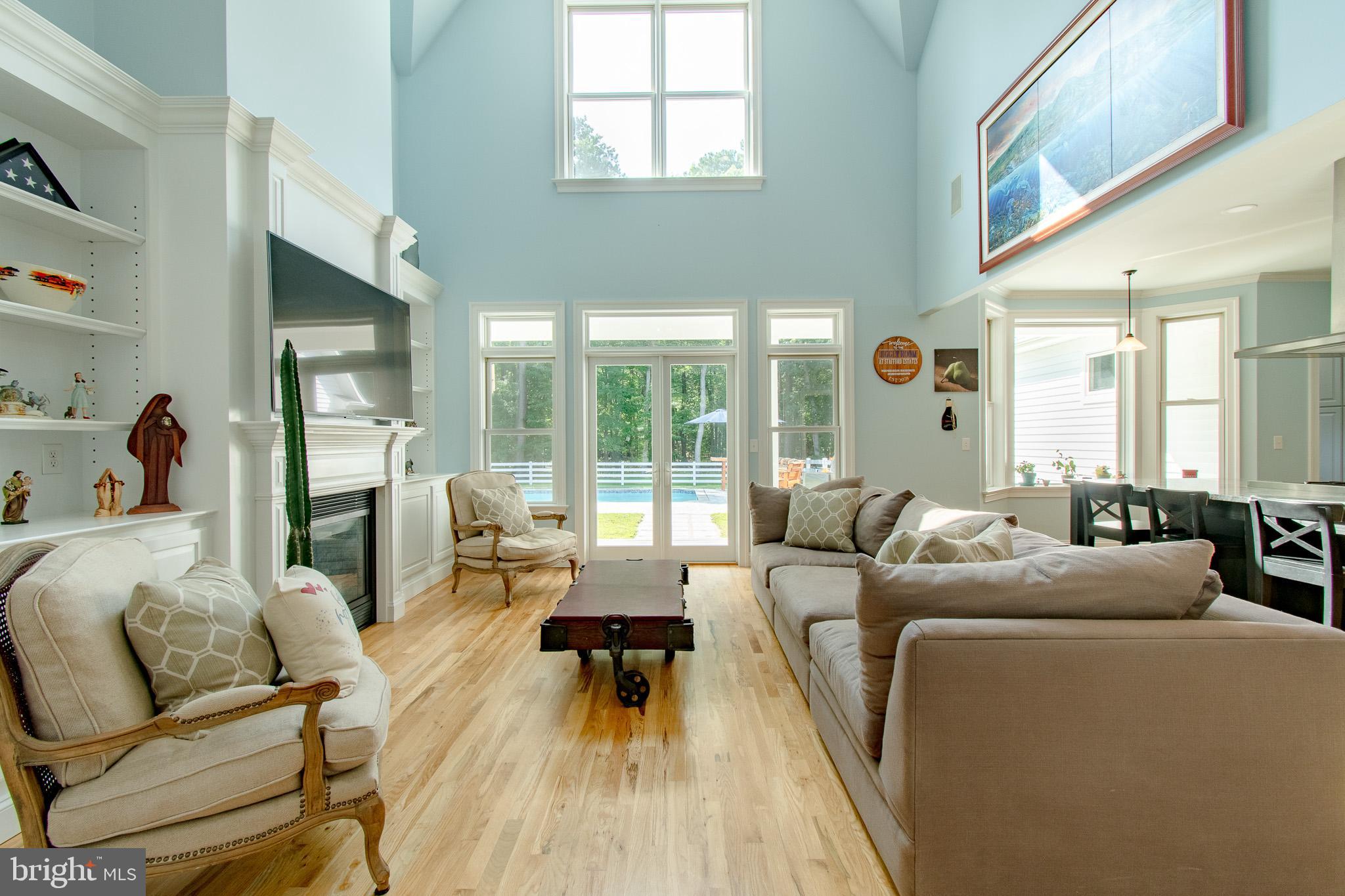 7841 Pea Neck Road St. Michaels, MD 21663 - Photo 14 of 41 a living room with furniture and a large window