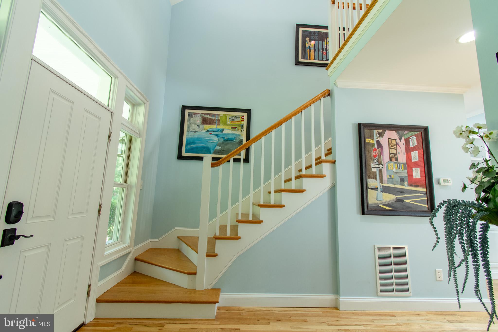 7841 Pea Neck Road St. Michaels, MD 21663 - Photo 23 of 41 a view of entryway and hall with wooden floor