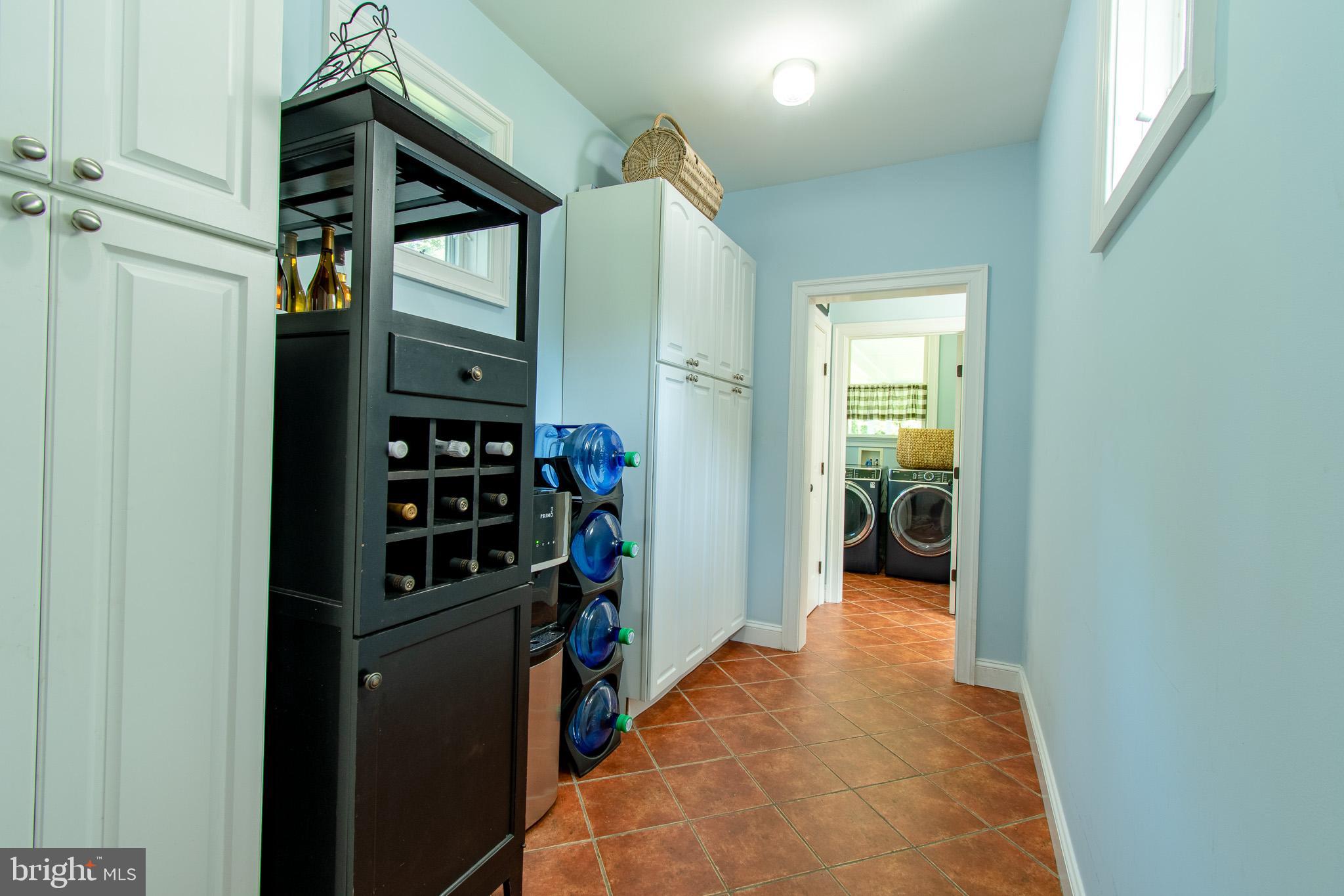 7841 Pea Neck Road St. Michaels, MD 21663 - Photo 31 of 41 a view of a hallway with closet and a bathroom