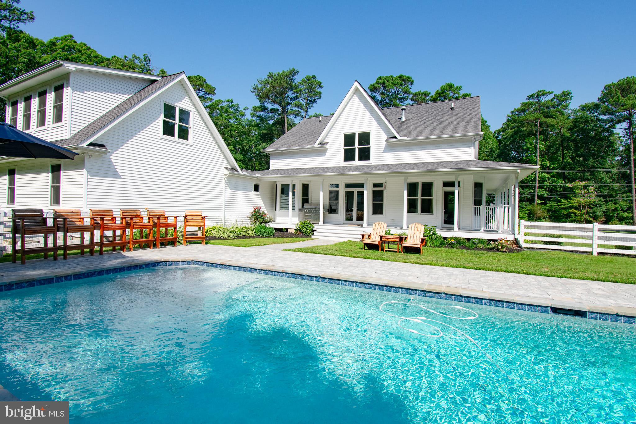 7841 Pea Neck Road St. Michaels, MD 21663 - Photo 8 of 41 a view of a house with a swimming pool