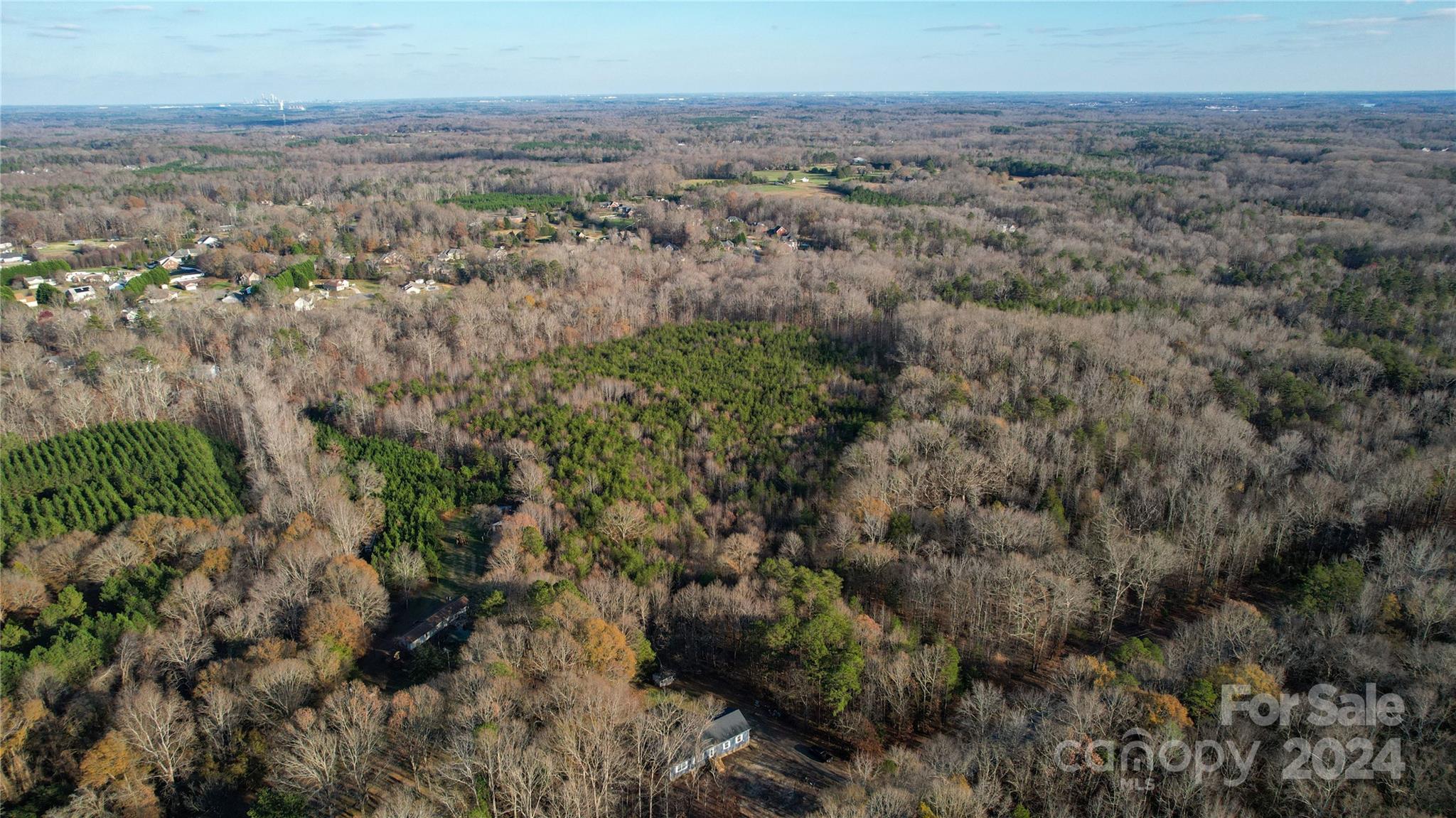 0 Meek Road Gastonia, NC 28056 - Photo 1 of 12 an aerial view of house with yard and mountain view in back
