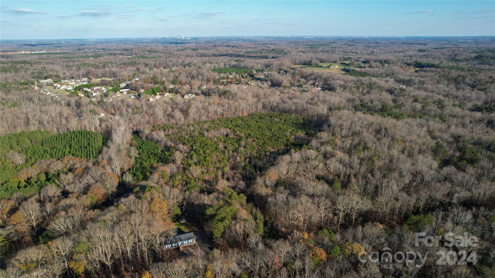 0 Meek Road Gastonia, NC 28056 - Photo 12 of 12 a view of a city with lush green forest