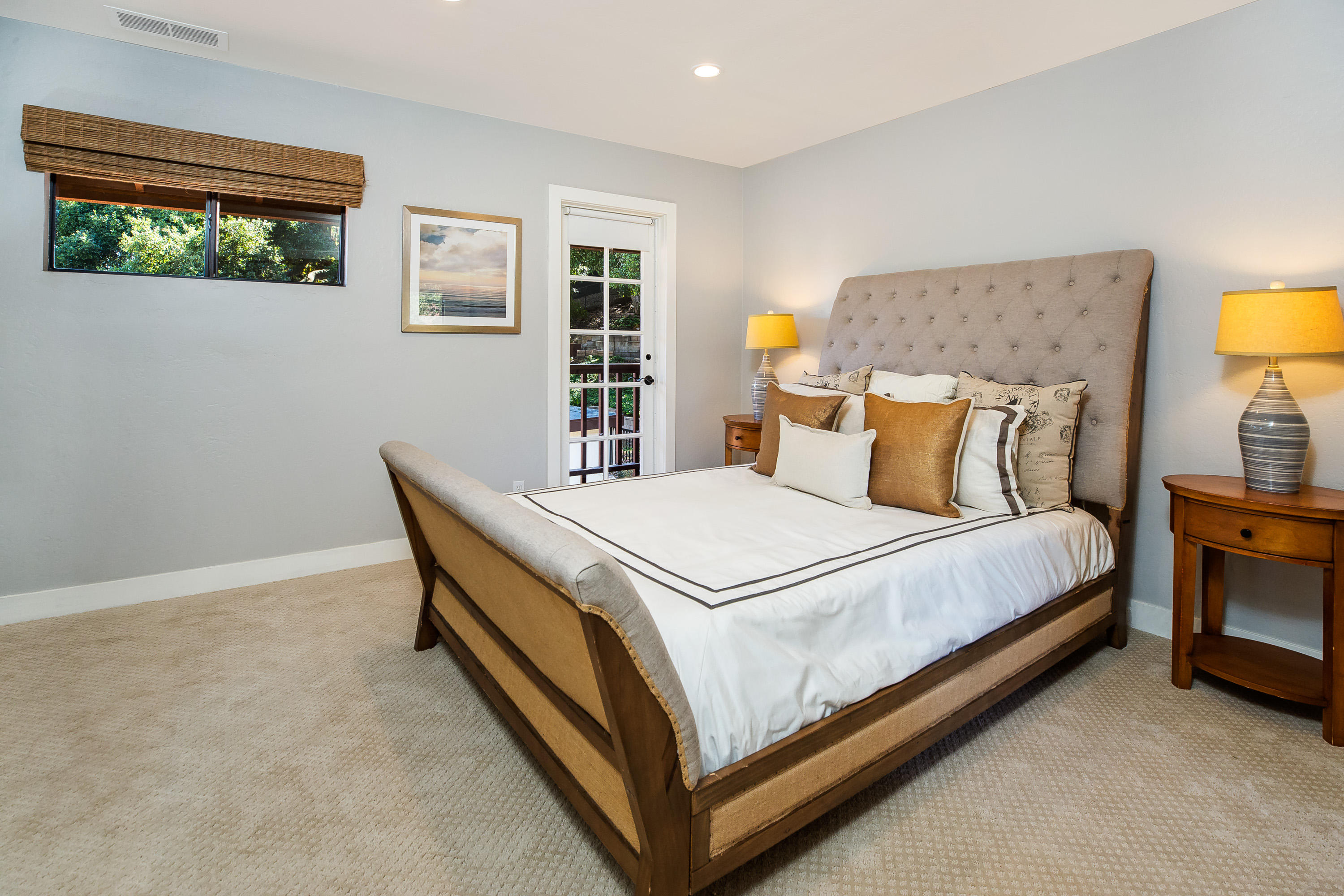 907 Fellowship Road Santa Barbara, CA 93109 - Photo 11 of 21 a bedroom with a bed and lamp