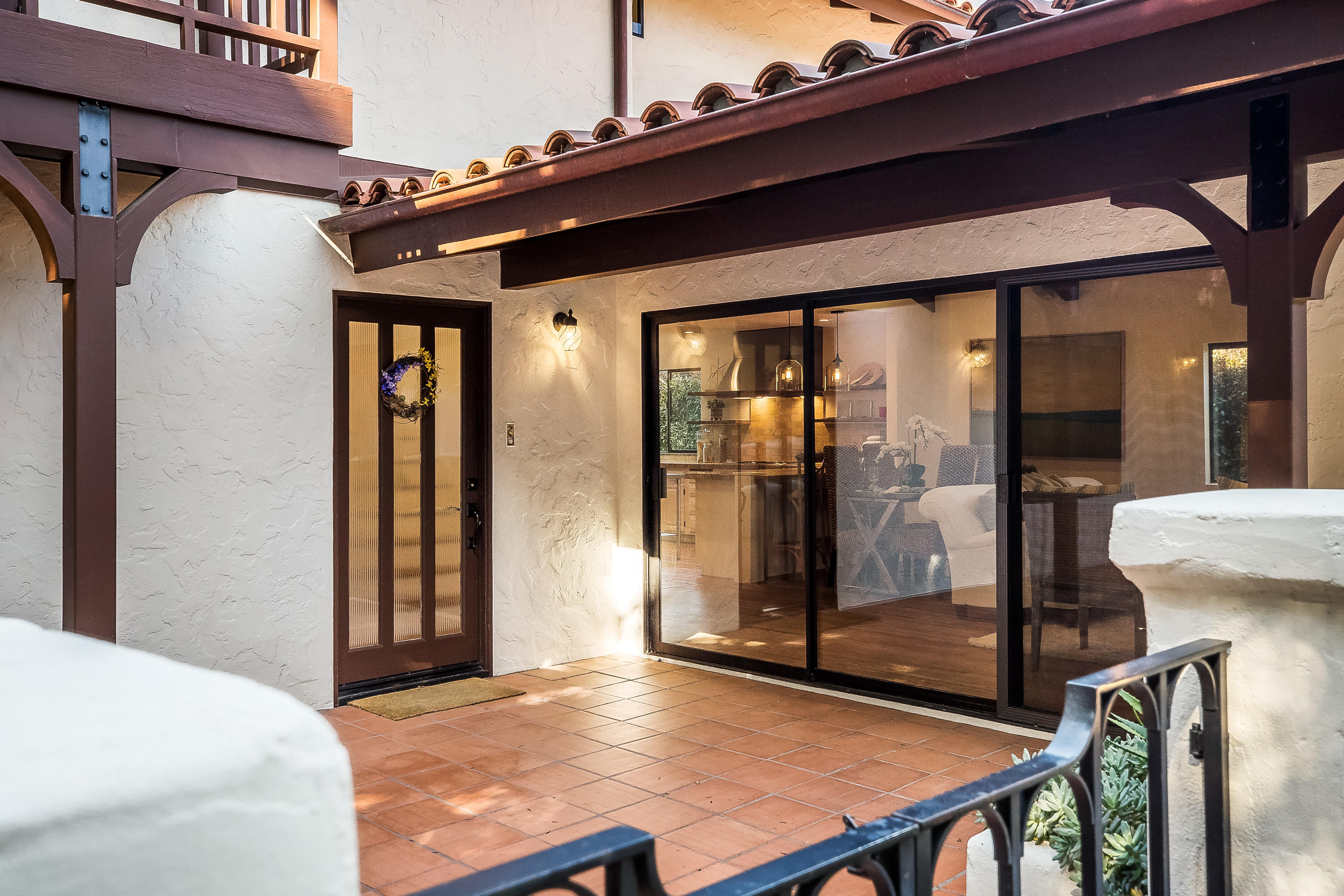 907 Fellowship Road Santa Barbara, CA 93109 - Photo 2 of 21 a view of a balcony with floor to ceiling window and kitchen