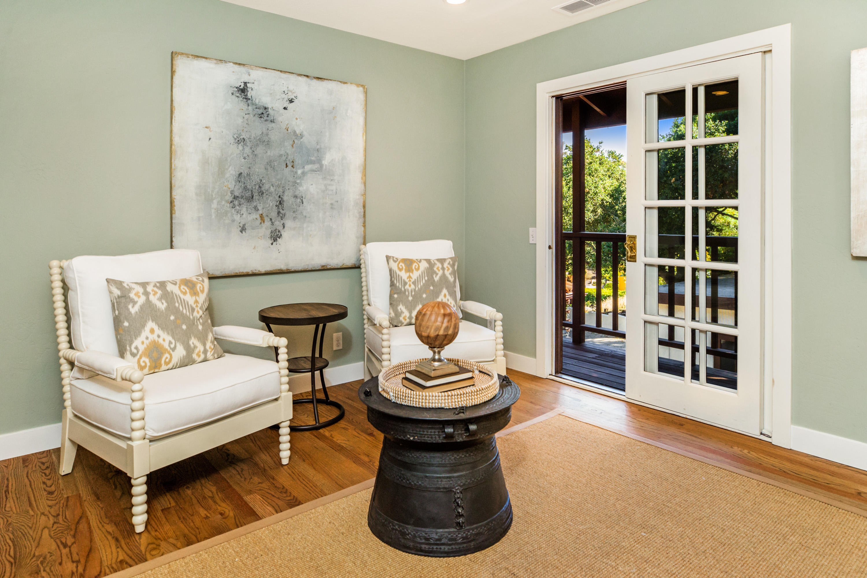 907 Fellowship Road Santa Barbara, CA 93109 - Photo 7 of 21 a living room with furniture a lamp and rug