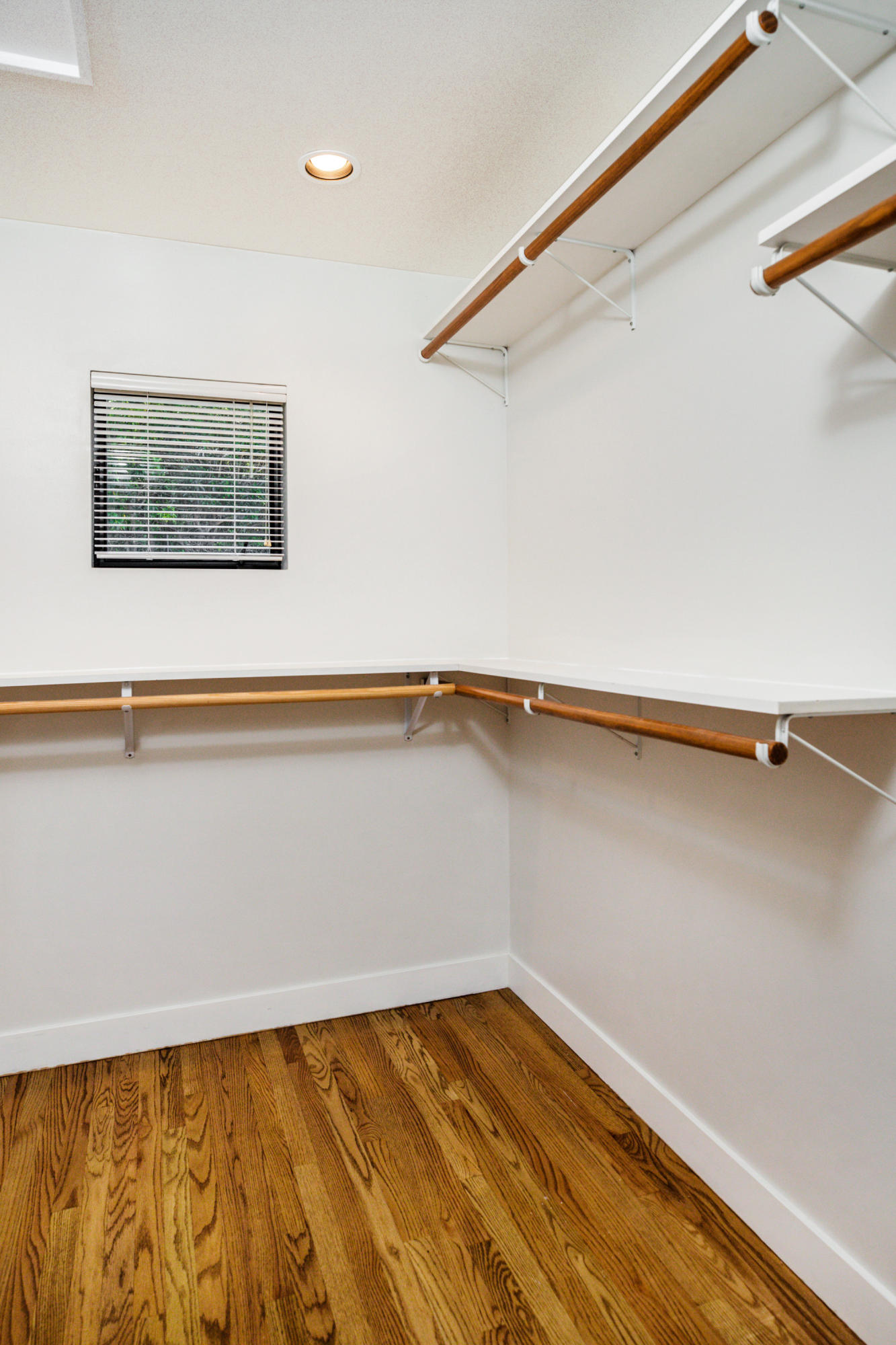 907 Fellowship Road Santa Barbara, CA 93109 - Photo 9 of 21 a view of a room with wooden floor and cabinet