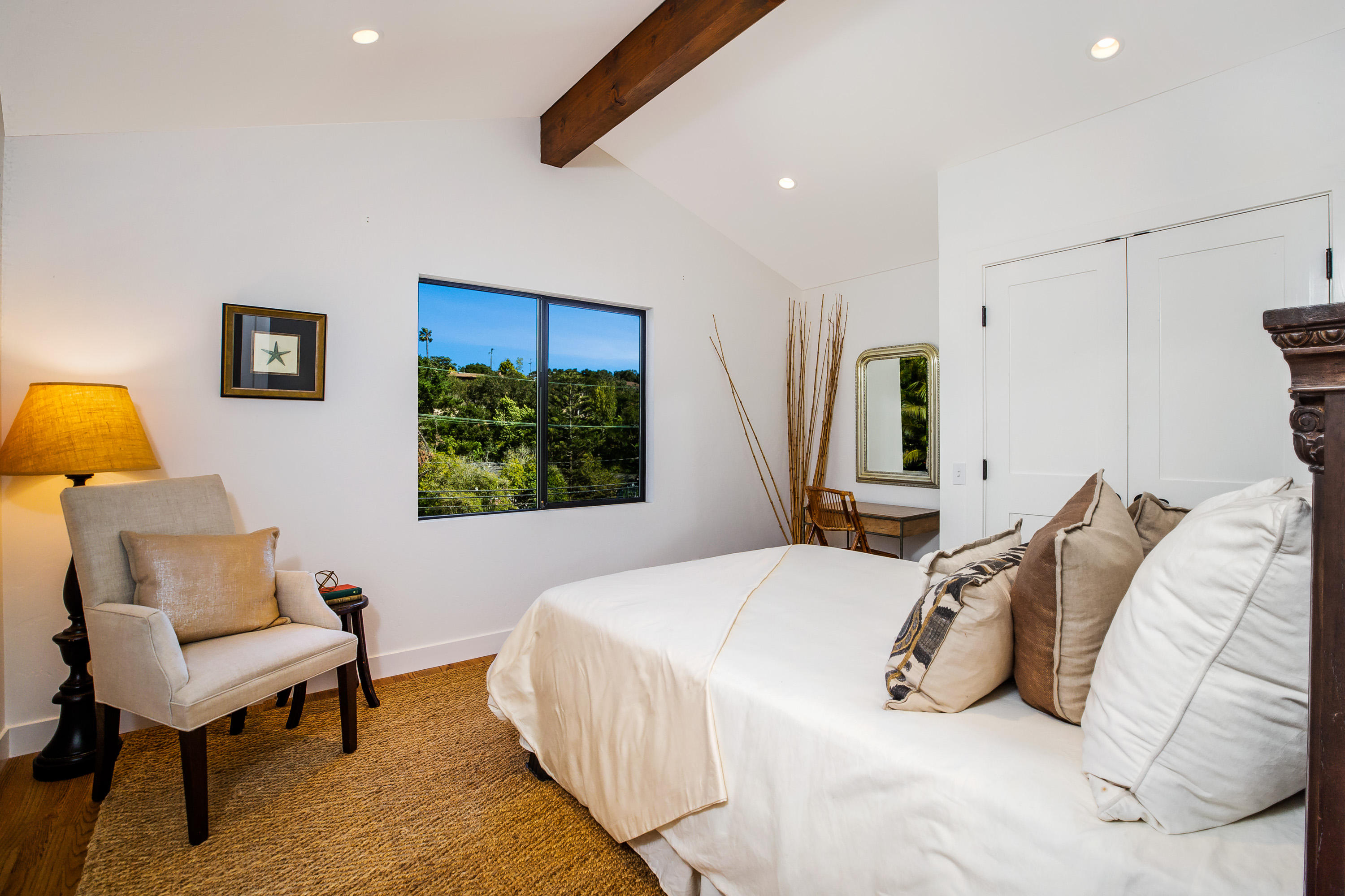 907 Fellowship Road Santa Barbara, CA 93109 - Photo 10 of 21 a bedroom with furniture and a chair
