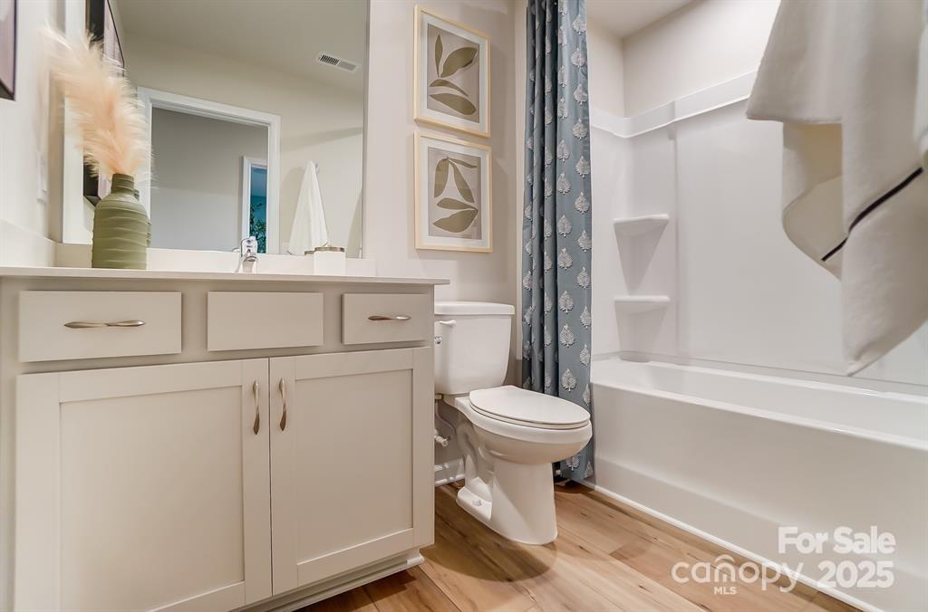 629 Cassidy Court Clover, SC 29710 - Photo 11 of 15 a bathroom with a toilet sink and a bathtub