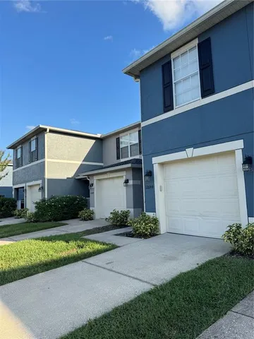 a view of outdoor space yard and front view of a house