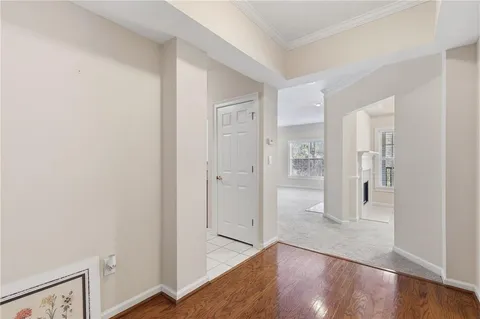 a view of a bathroom with a sink and a mirror
