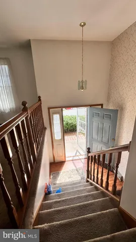 a kitchen with a refrigerator stove and sink