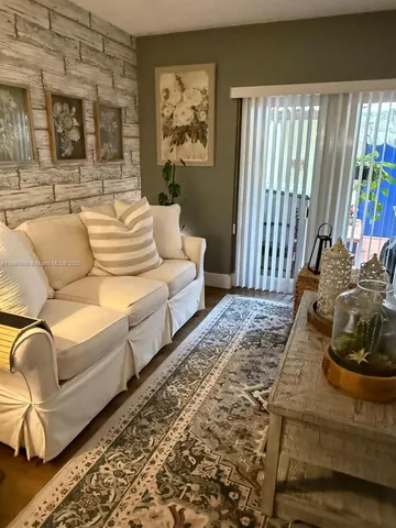 a bathroom with a sink mirror vanity and toilet