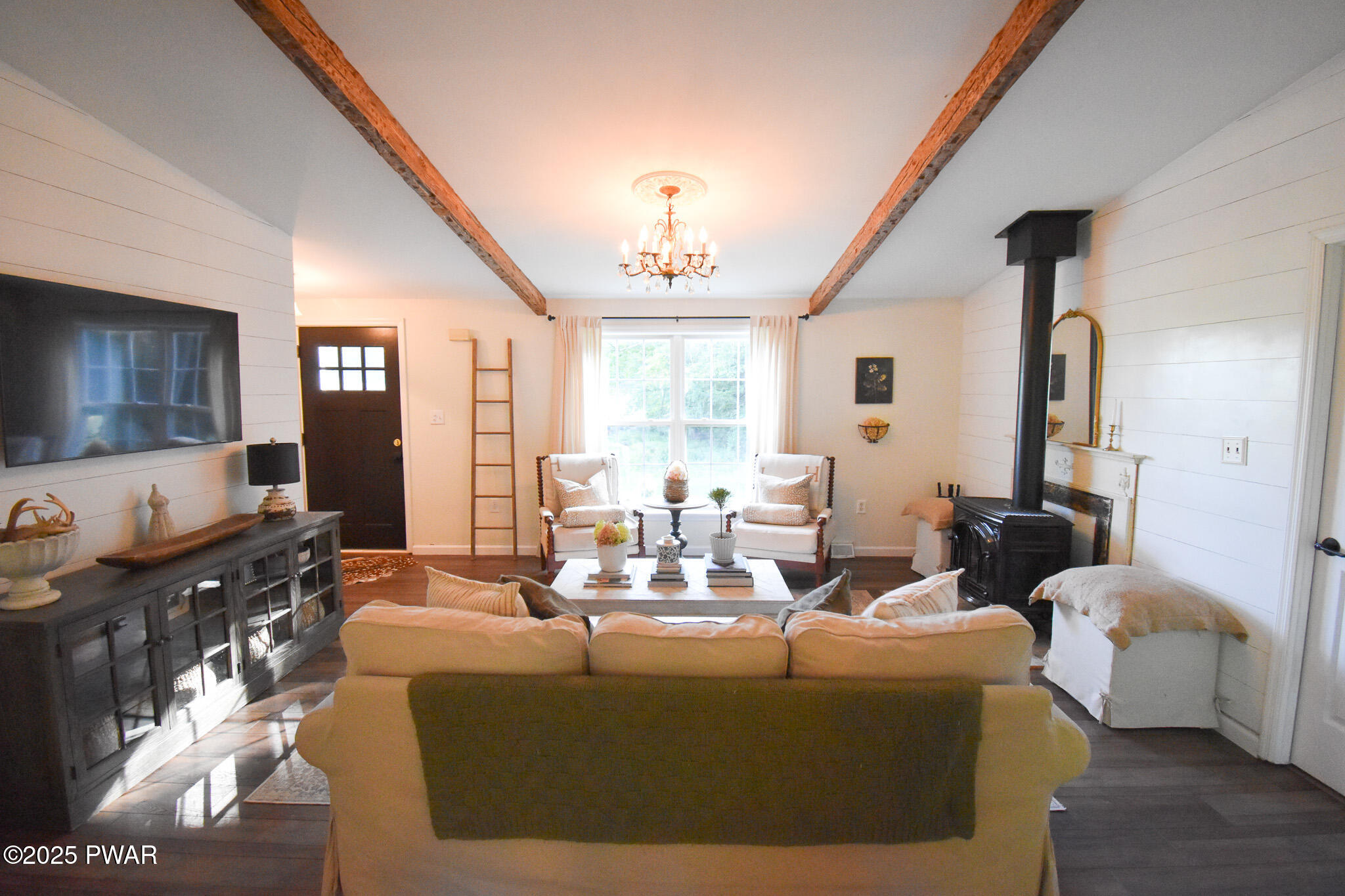 66 Wash Road Waymart, PA 18472 - Photo 13 of 41 a living room with furniture flat screen tv and window