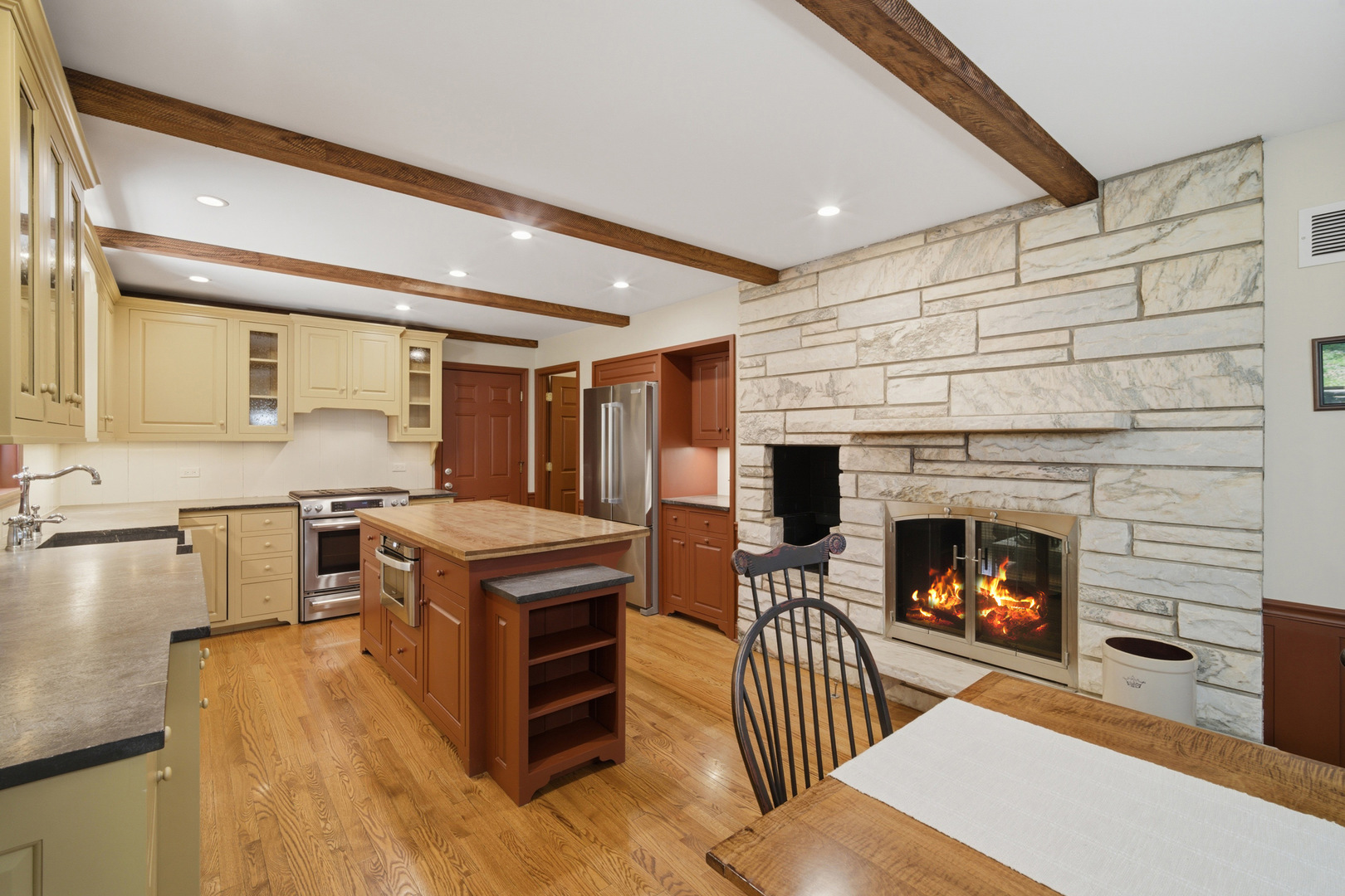 237 Beachview Lane North Barrington, IL 60010 - Photo 10 of 26 a kitchen with furniture and a fireplace