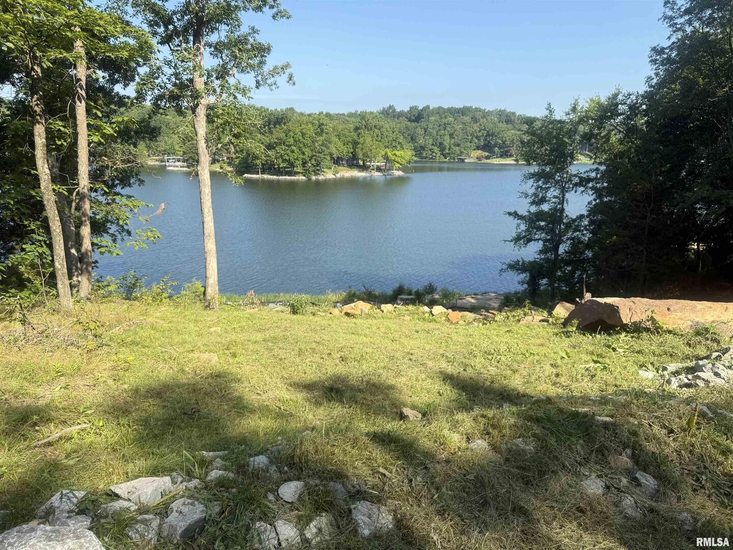 an outdoor space with lake view