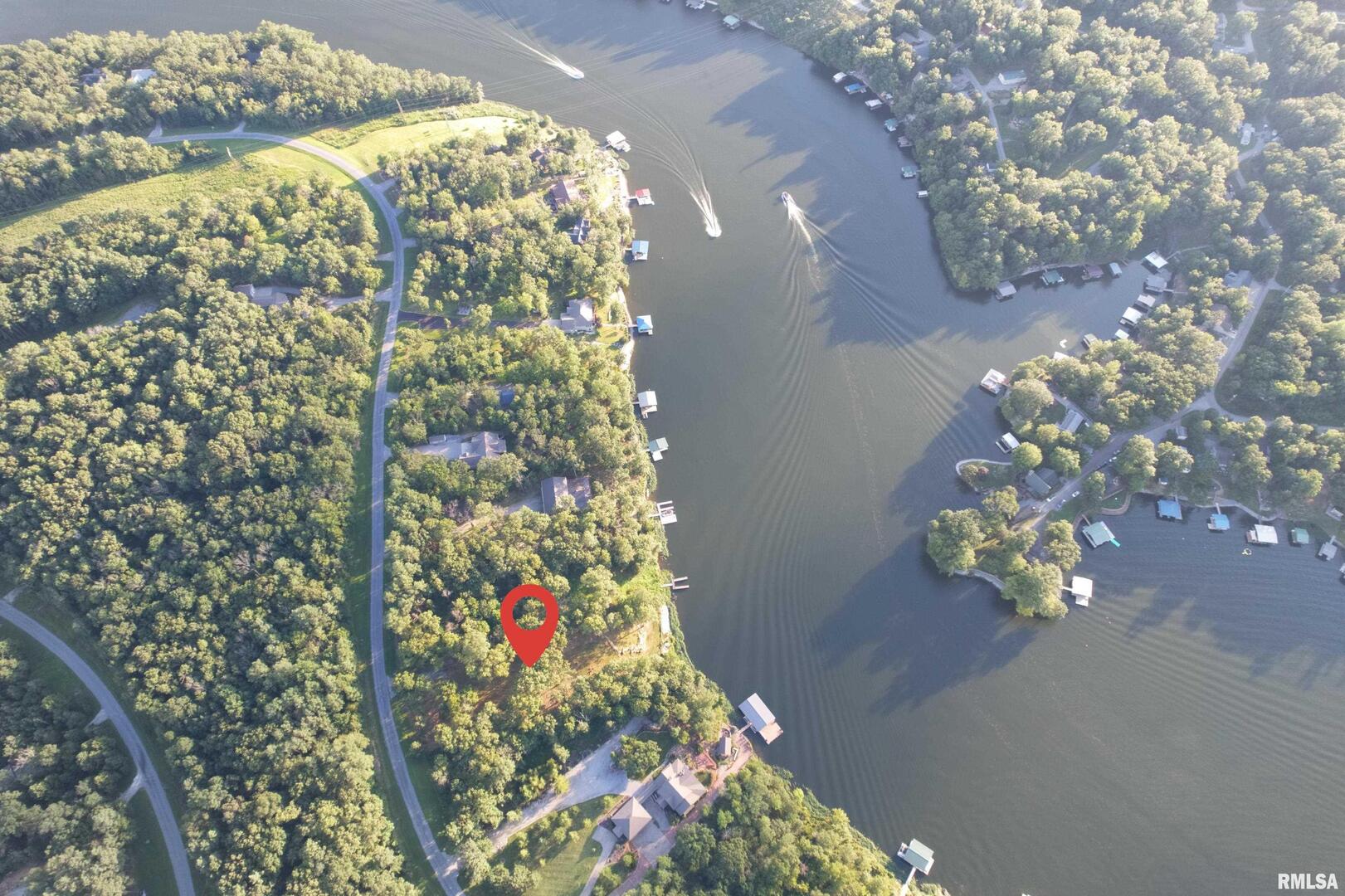 Lot 186-187 Parrish Ridge Lane Goreville, IL 62939 - Photo 21 of 23 a vase of flowers sitting on a floor