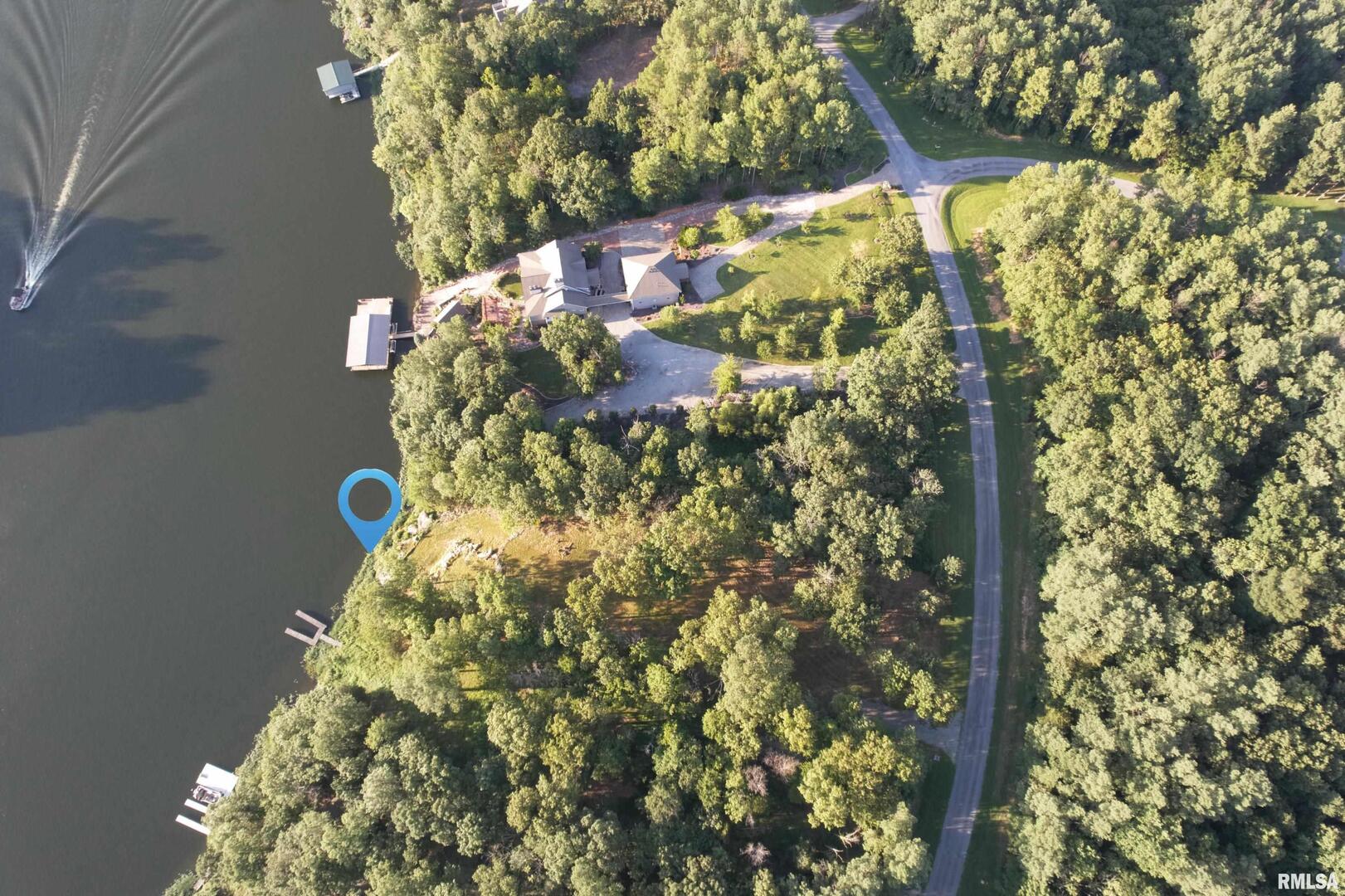 Lot 186-187 Parrish Ridge Lane Goreville, IL 62939 - Photo 22 of 23 a close up of a flower in a garden